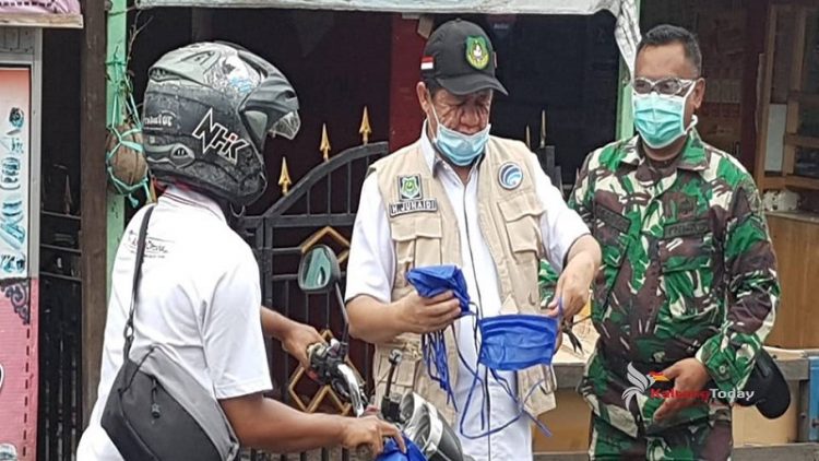 Selain Bagi masker, Tim Covid-19 Kapuas Gencar Lakukan Sosialisasi