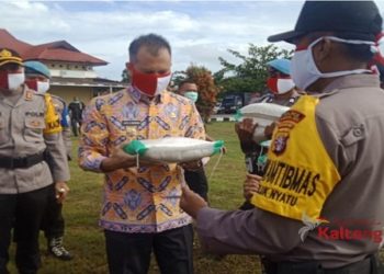 Polres Gumas Gelar Apel Pendistribusian Bansos Covid-19