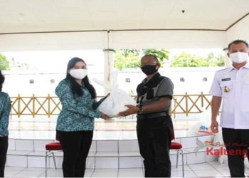 Ketua PKK Gumas Ingatkan Wartawan Untuk Selalu Patuhi Protokol COVID-19