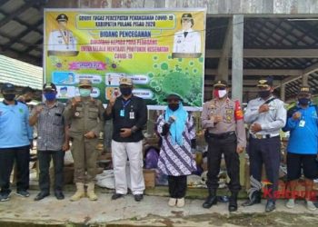 Gugus Tugas Covid-19 Pulang Pisau Lakukan Sosialisasi di Pasar Mingguan Sebangau