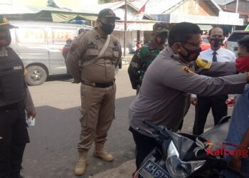 Polres Seruyan Bagikan 1.000 Masker Kepada Warga Kuala Pembuang