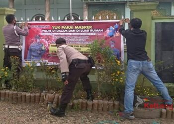 Polsek Danau Sembuluh Kembali Pasang Spanduk Imbauan Wajib Masker