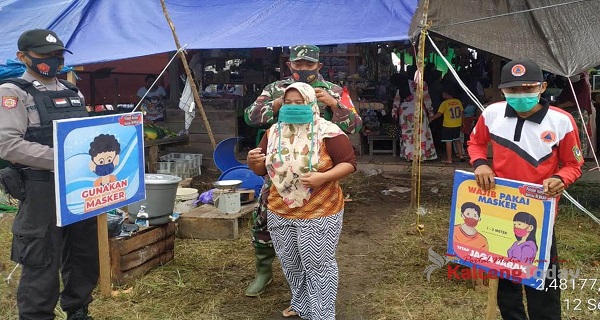 Polsek Hanau Giatkan Gerakan Bermasker Di Pusat Keramaian