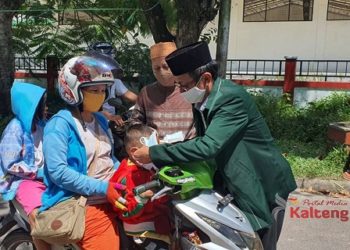 NU Kotim Dan Polda Kalteng Salurkan Masker dan Hand Sanitizer