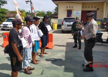 Polsek Kota Besi Terus Giatkan Protokol Kesehatan Kepada Warga