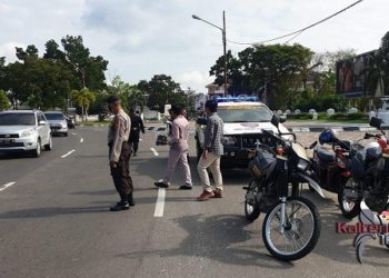 Sosialisasi Tentang 4 M, Brimob Polda Kalteng Patroli Yustisi Covid-19 di Palangka Raya