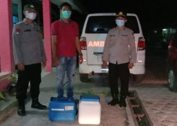 Polsek Hanau Kawal Pendistribusian Dan Penerimaan Vaksin Covid-19