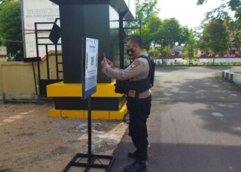 Seluruh Personel Wajib Scan Barcode Aplikasi Peduli Lindungi Sebelum Masuk Mapolres Seruyan