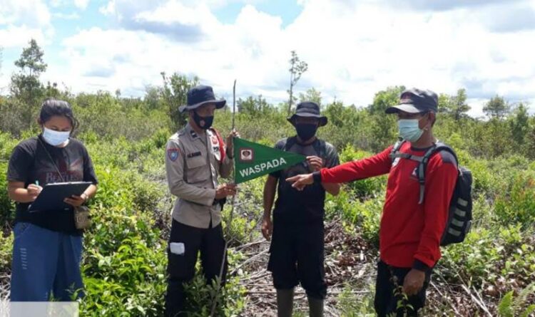 Bhabinkamtibmas Polsek Bukit Baru Sosialisasi Bahaya Karhutla Bagi Masyarakat
