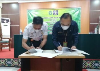 Rutan dan PN Palangka Raya Tandatangani MOU Aplikasi E-Bezuk