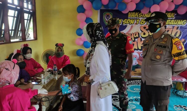 Polsek Seruyan Hilir Lakukan Pengamanan Vaksinasi di Desa Baung