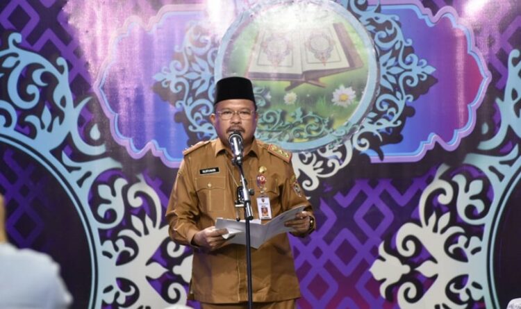 Pj. Sekretaris Daerah Prov. Kalteng H. Nuryakin saat membacakan sambutan tertulis Gubernur Kalteng H. Sugianto Sabran