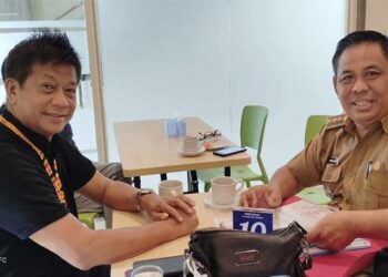 Camat Tualan Hulu Admadi Satra bersama Anggota Komisi VII DPR RI Willy M Yoseph