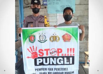 Polsek Katingan Kuala ketika memberikan memberikan peringatan saber pungli