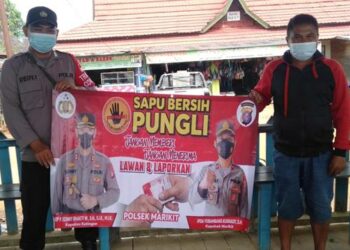 Polsek Marikit ketika melaksanakan edukasi kepada masyarakat, Sabtu (4/6/2022).