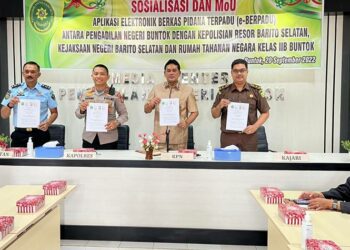 Foto : Penandatanganan Mou Aplikasi e-Berpadu (ist)