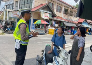 Ingatkan Pengendara Tak Pakai Helm