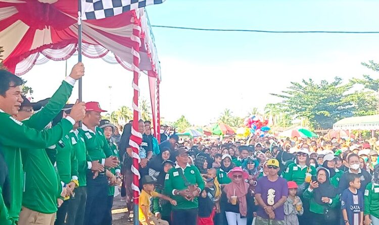 Pj Bupati Kapuas Peringati May Day Dengan Jalan Santai Bersama Buruh dan Masyarakat