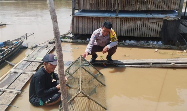 Polsek Sabangau Bangun Kolaborasi Dengan Pemilik Keramba Ikan di Bereng Bengkel